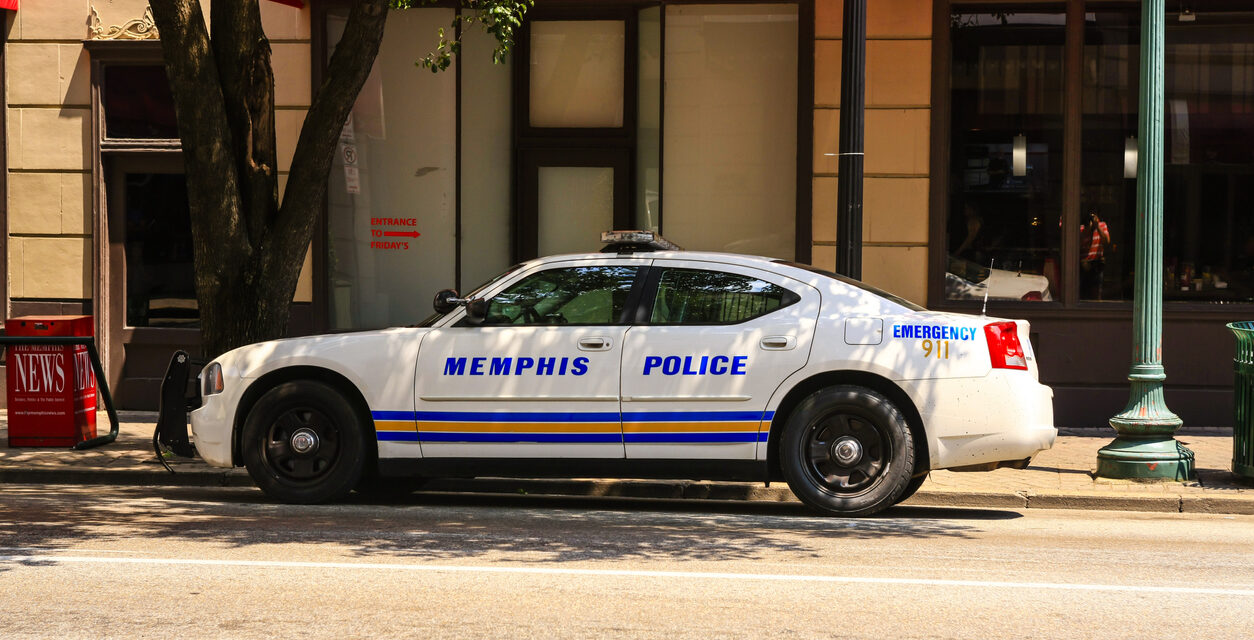 Memphis city Police vehicle parked up under a tree downtown